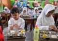 Over 1,000 children fall ill from free school lunches in Indonesia