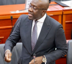 Kojo Oppong Nkrumah with a youthful lady in his constituency